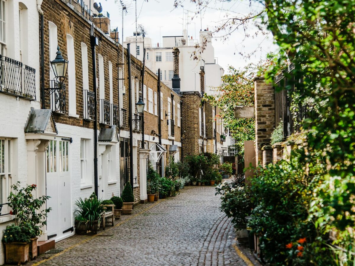 Cobbled mews with white painted houses
