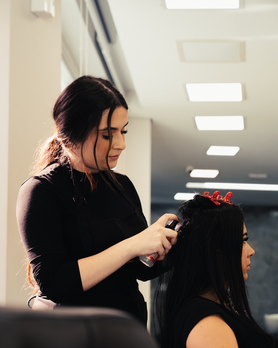 Iris cutting a client's hair at the chair