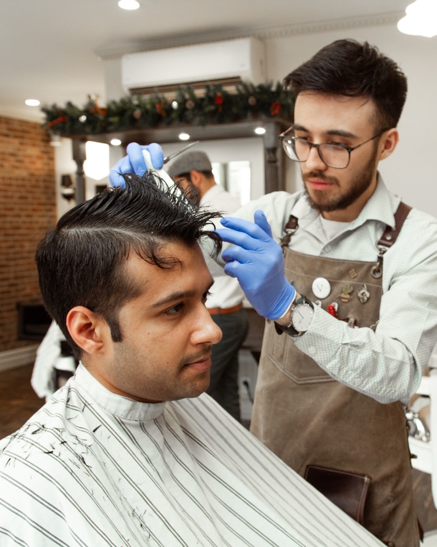 Dominic working colour through a client's hair at the chair