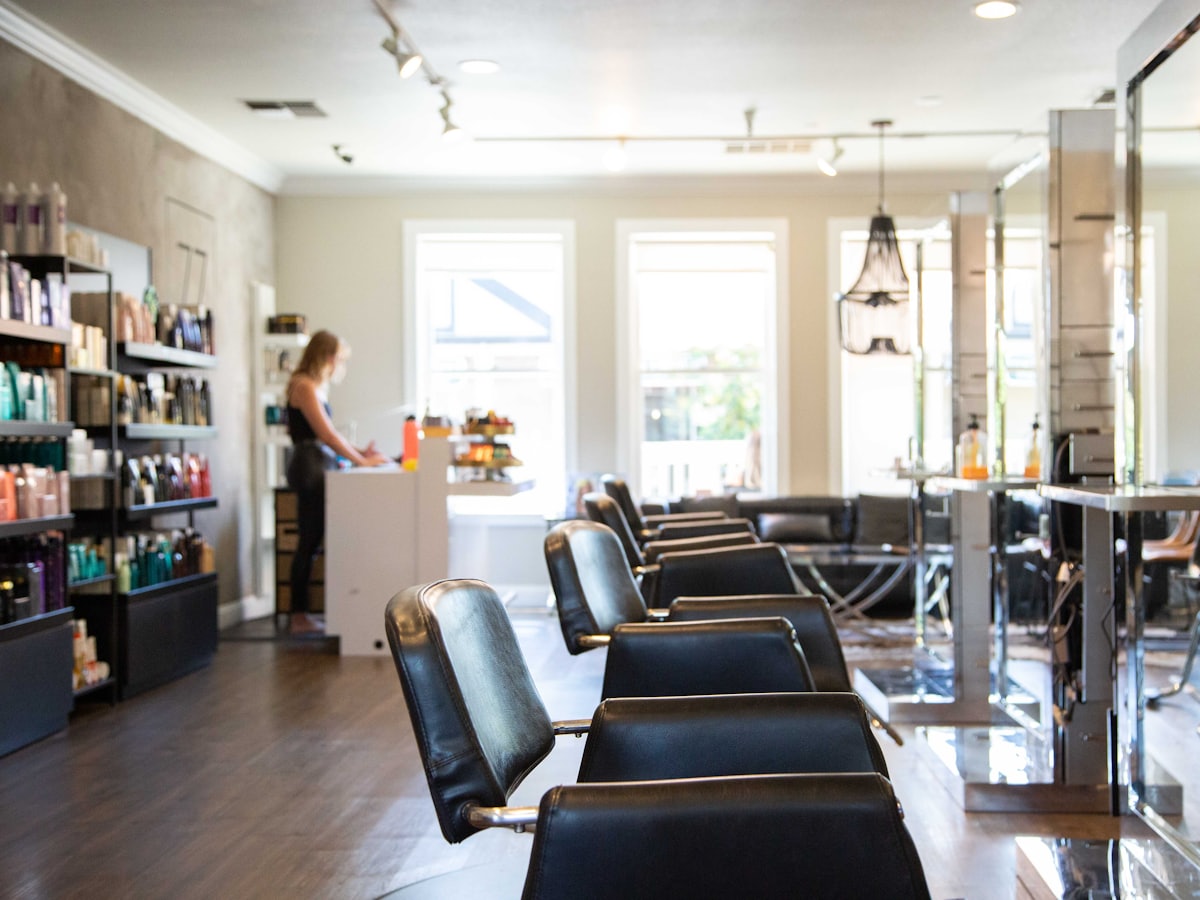 Inside the salon, looking down the row of chairs
